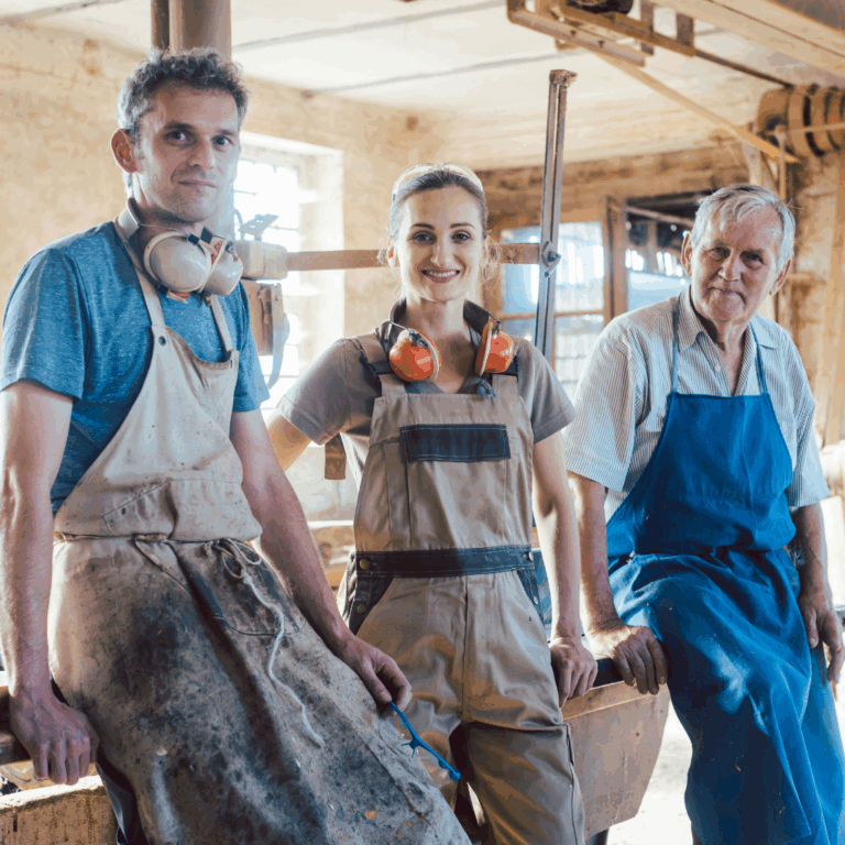 Father, Son and Daughter in workshop